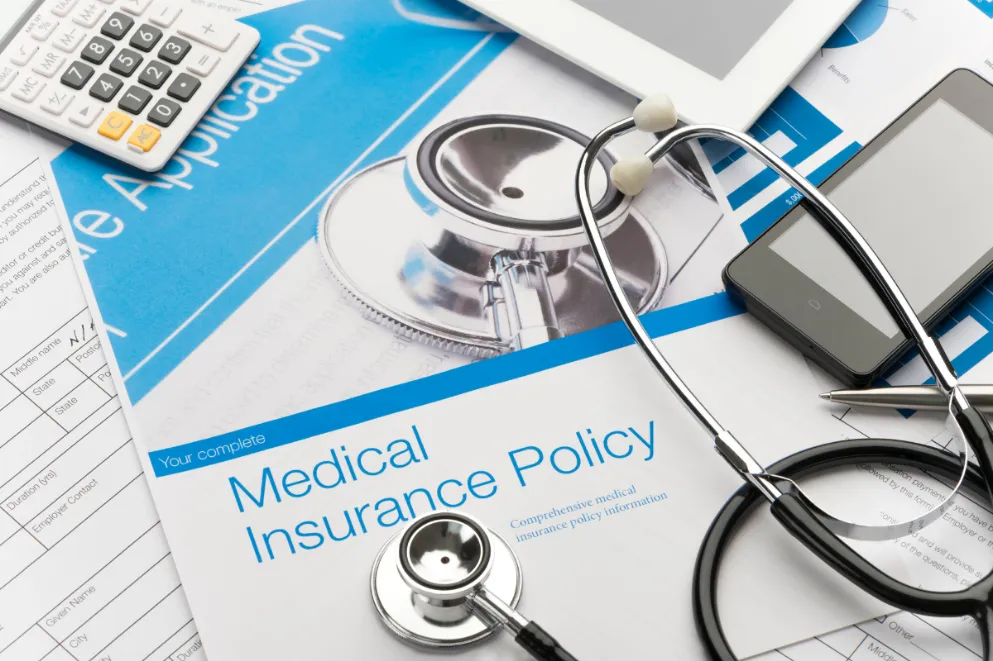 Medical insurance policy brochure with paperwork 