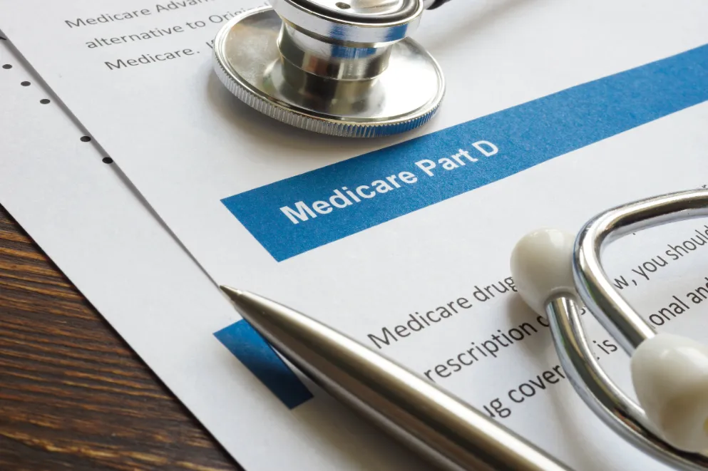 Medicare Part D Paperwork with Pen and Stethoscope
