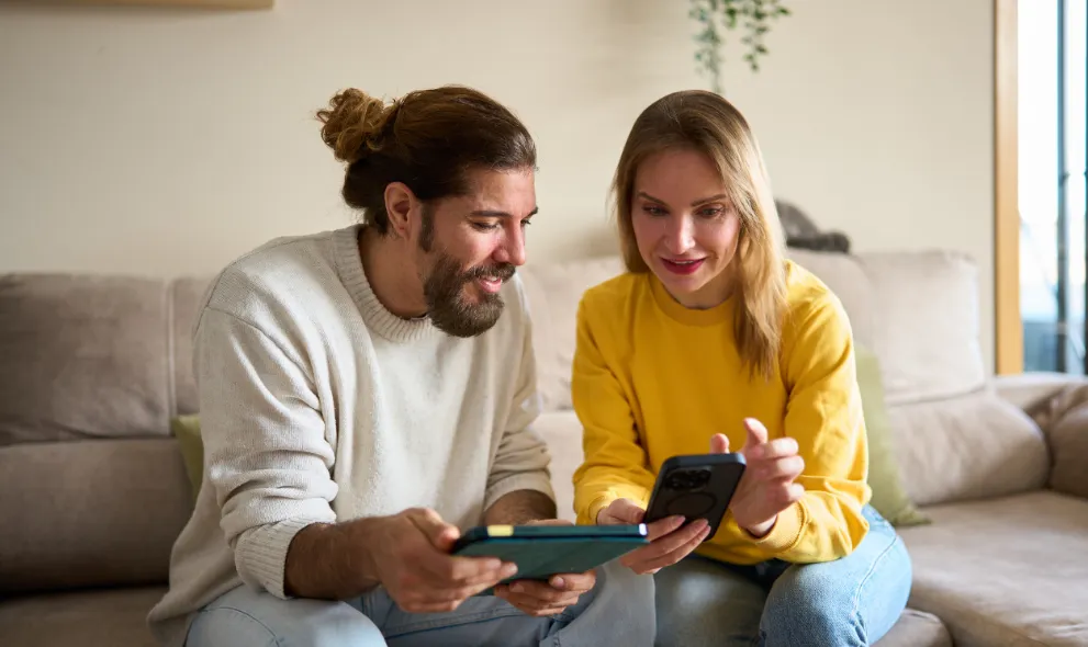 Couple comparing prescription prices online