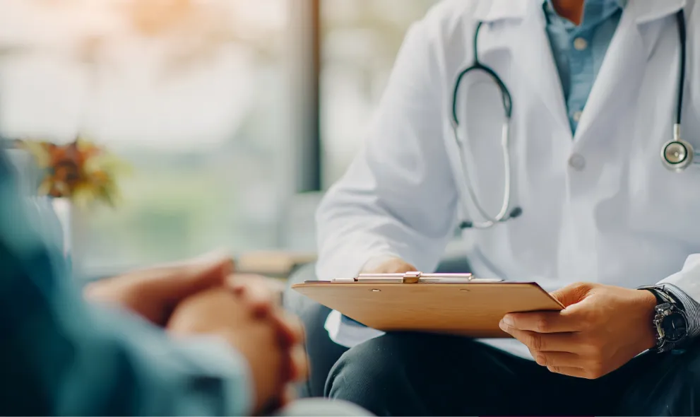 Doctor consulting with patient