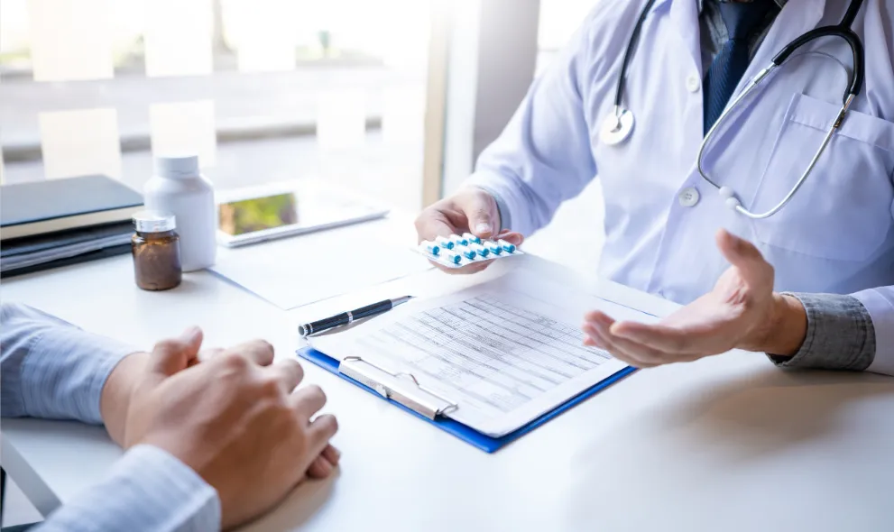 Doctor discussing medication with patient