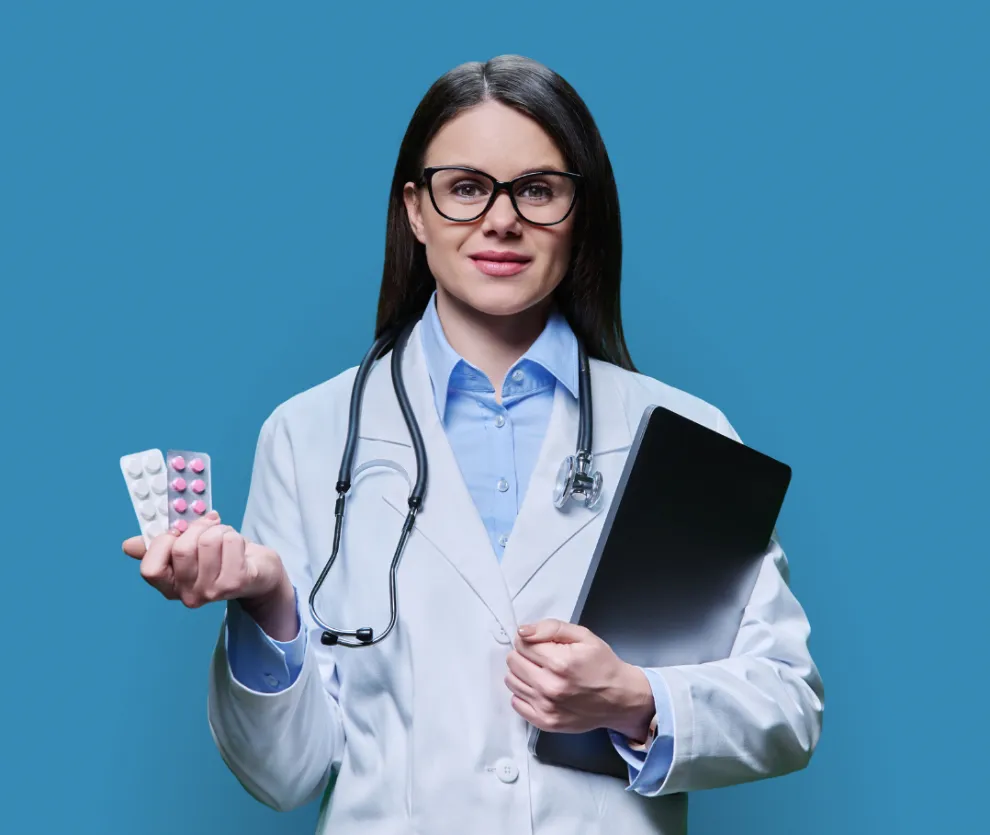 Doctor holding two medications