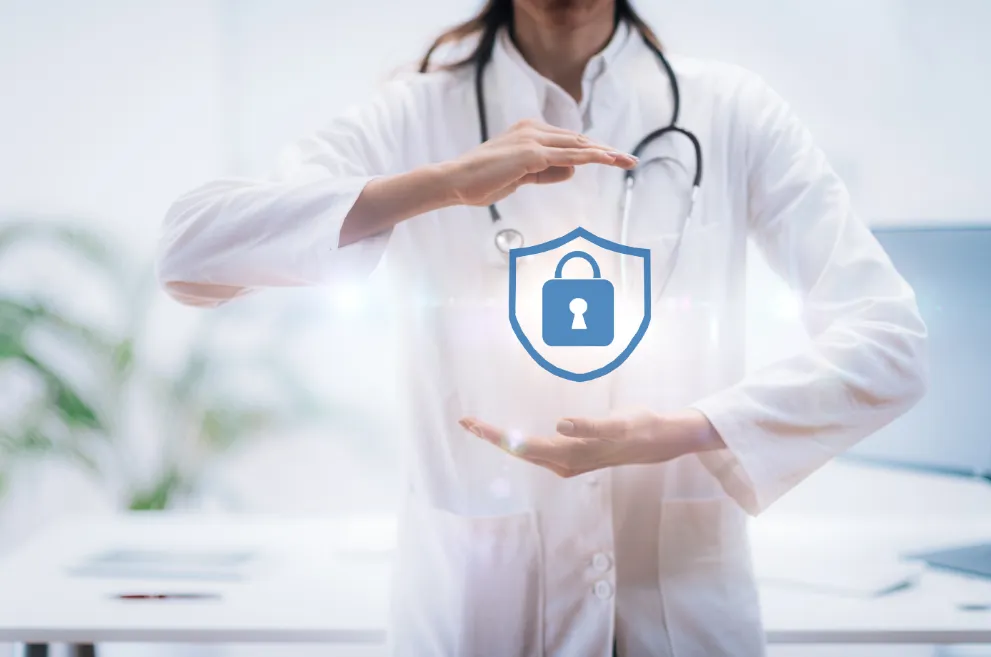 Doctor with hands around cybersecurity icon