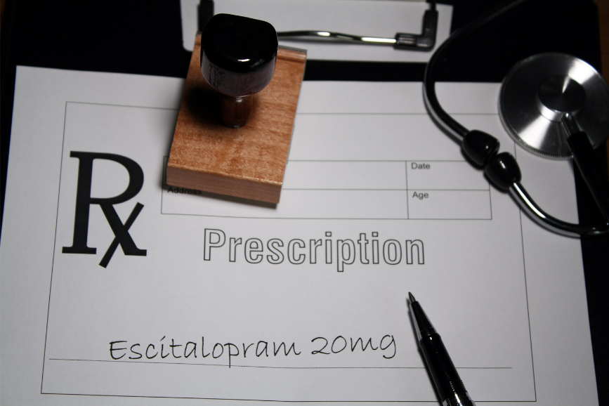Escitalopram prescription with pen and stamp