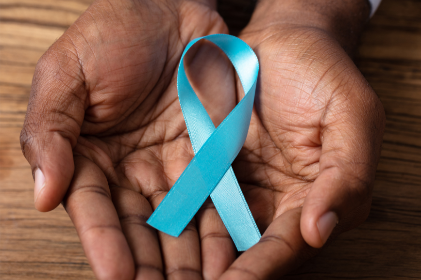 Hands holding blue cervical awareness ribbon