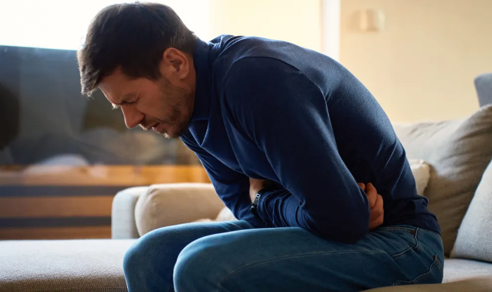 Man suffering from stomach pain