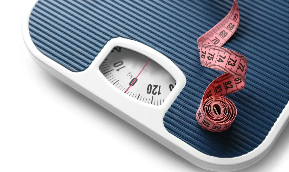 Measuring tape on weighing scale