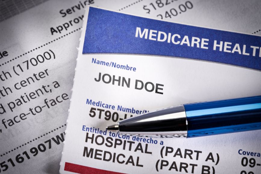 Medicare card with pen and statement