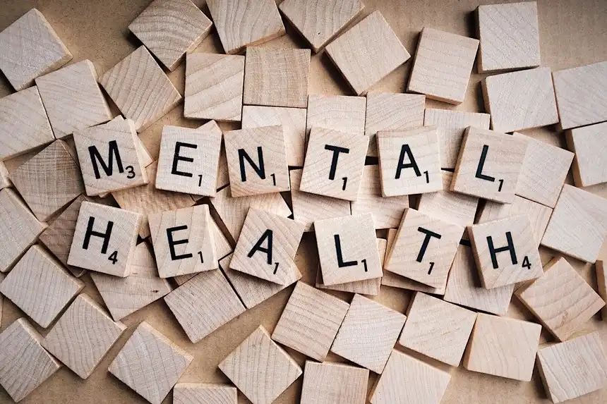 Mental health spelled out with scrabble tiles