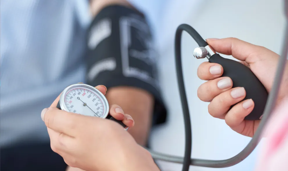 Nurse measuring patients blood pressure