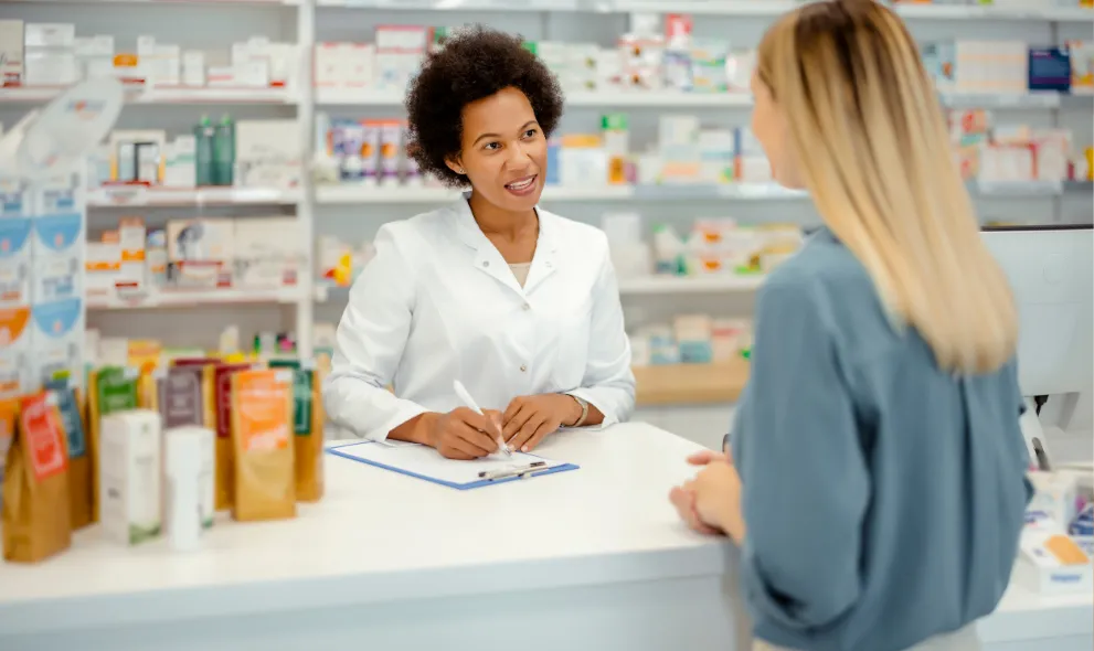 Pharmacist discussing options with patient