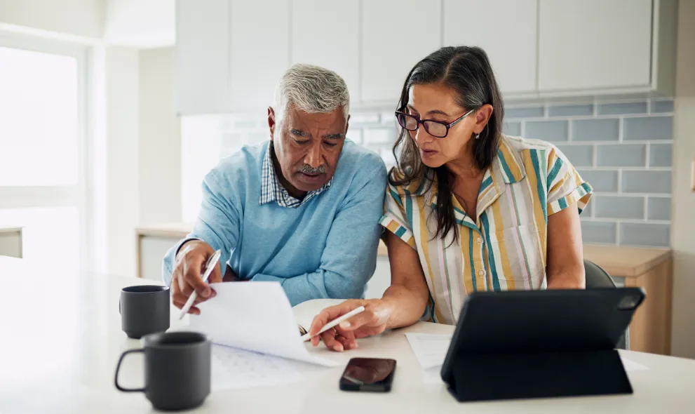 Senior couple reviewing finances