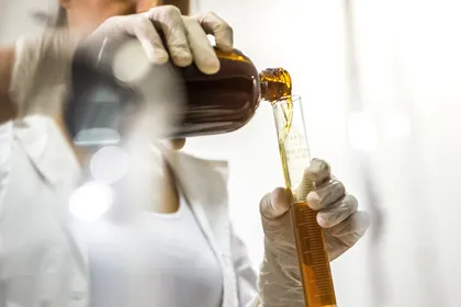 Pouring liquid in test tube