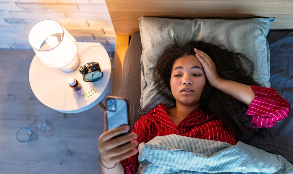 Woman having trouble falling asleep