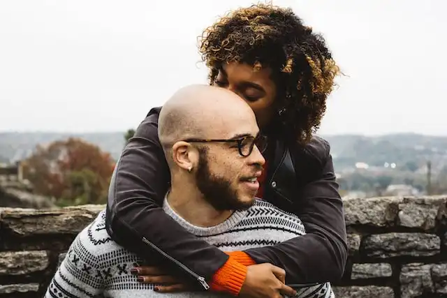 Woman Hugging Man