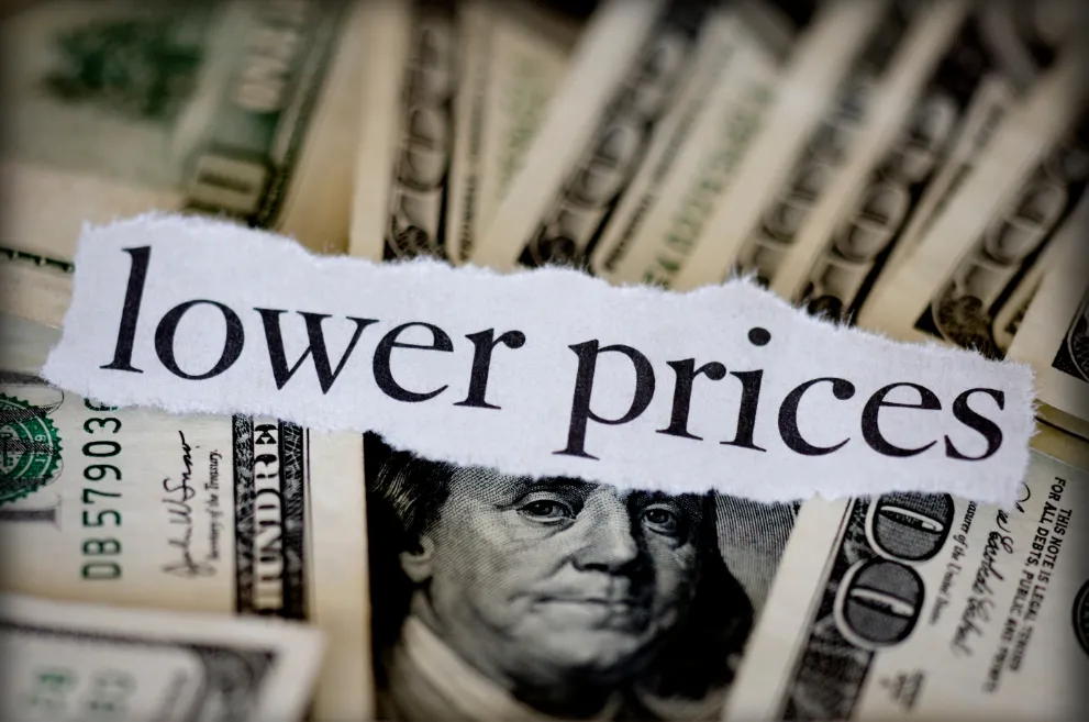 Words Lower Prices on top of US currency