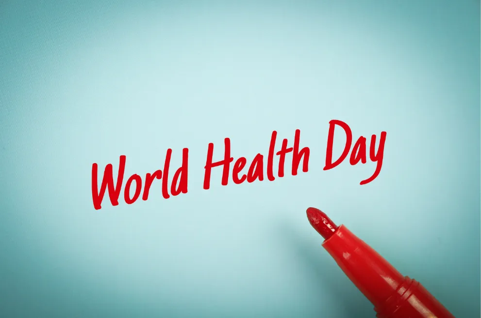 Words World Health Day in red with marker on light blue background