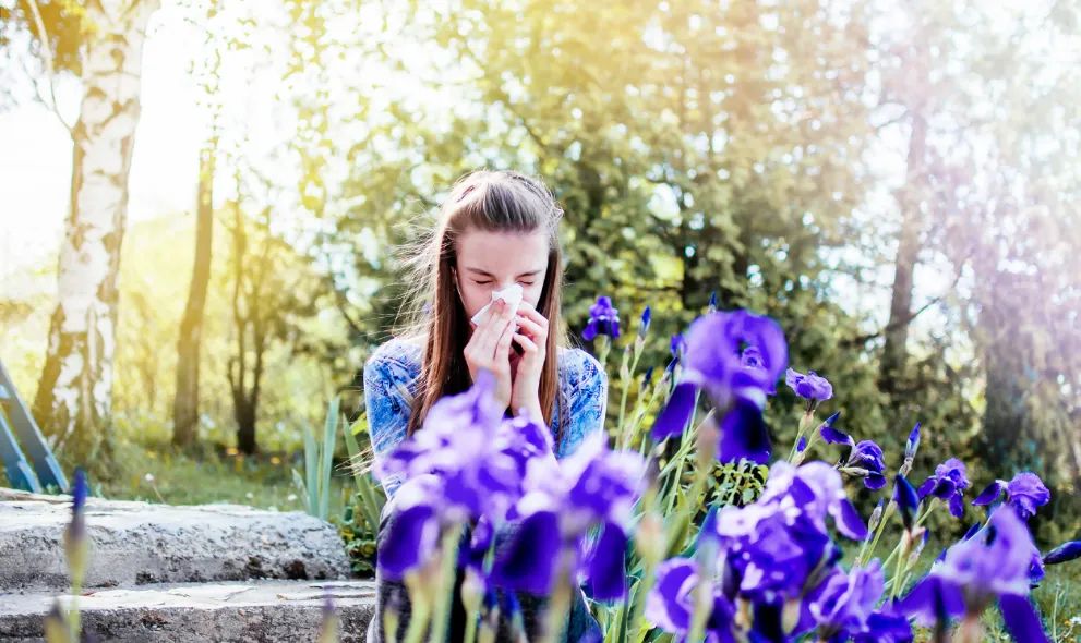 Young girl suffering from spring allergies
