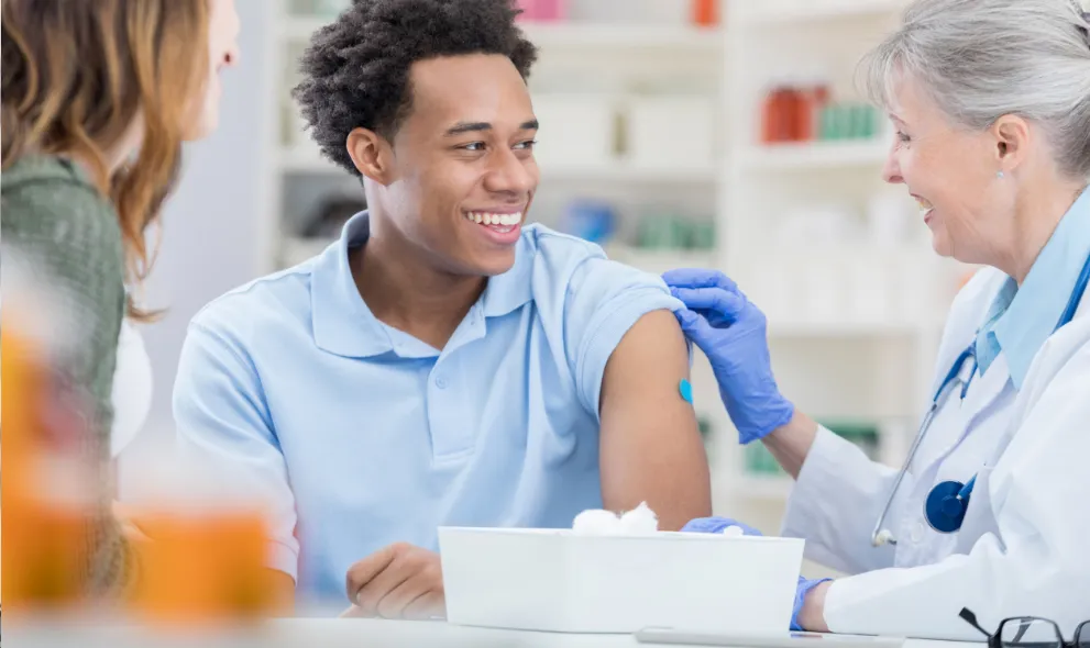 Young male getting his flu shot