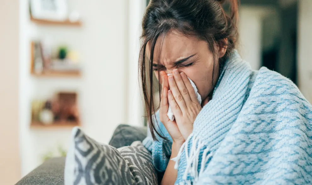 Young woman sick with the flu